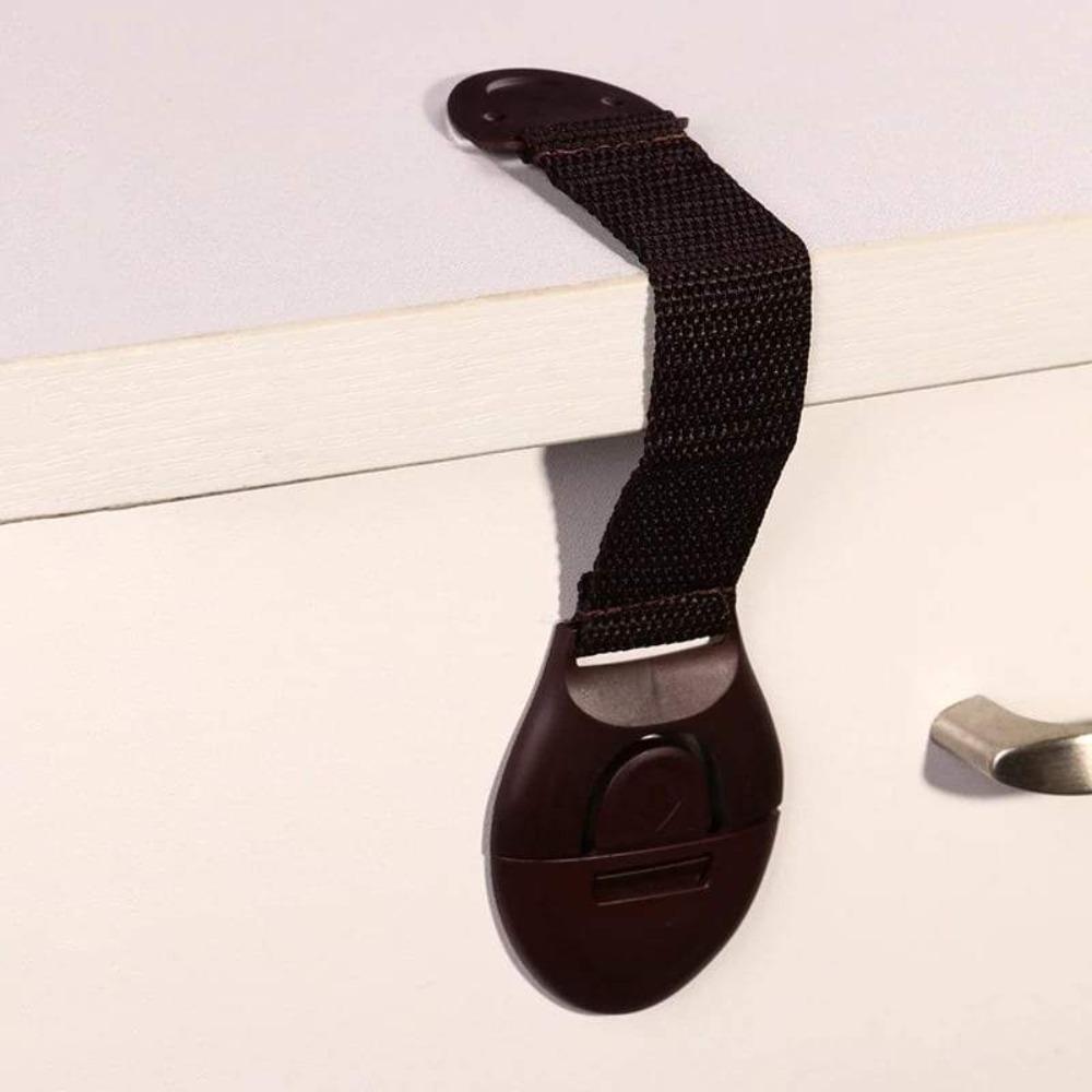 Secure 10-pack child safety locks for cabinet & drawer baby proofing. Enhanced home security, easy adhesive mount.