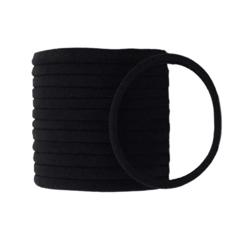 Close view of a purple soft nylon headband, a cozy kids' hairband