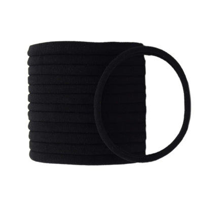 Close view of a purple soft nylon headband, a cozy kids' hairband
