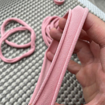 Variety of colorful soft nylon headbands, ideal for baby girls' fashion