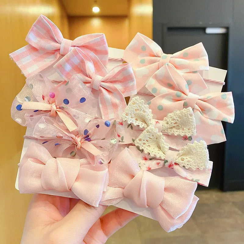Baby accessories: 10-pack soft elastic flower bow headbands. Cute hair ties.