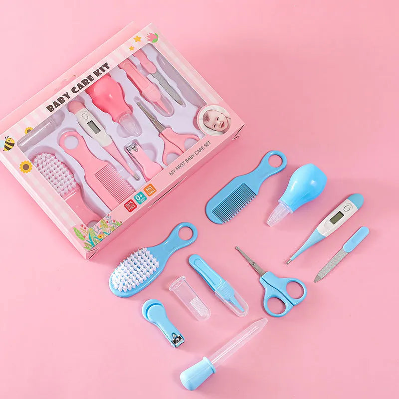 Contents of baby essentials kit: nasal aspirator, finger toothbrush, and ear cleaner