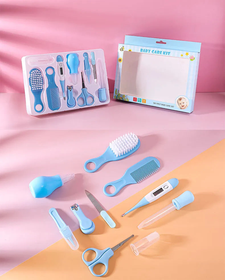 Baby safety kit with rounded-tip scissors and a soft-bristle brush for infants