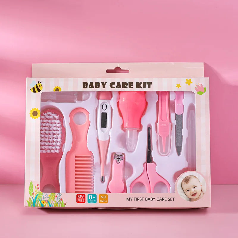Infant grooming kit with a nasal aspirator and a soft finger toothbrush for oral care