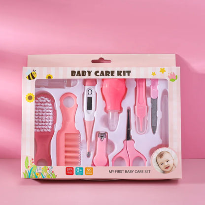 Infant grooming kit with a nasal aspirator and a soft finger toothbrush for oral care