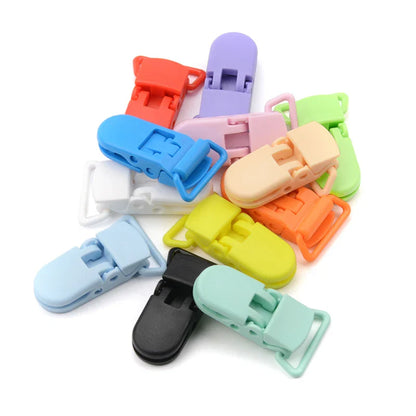 Variety of silicone bead pacifier clips in different colors, ideal for baby safety