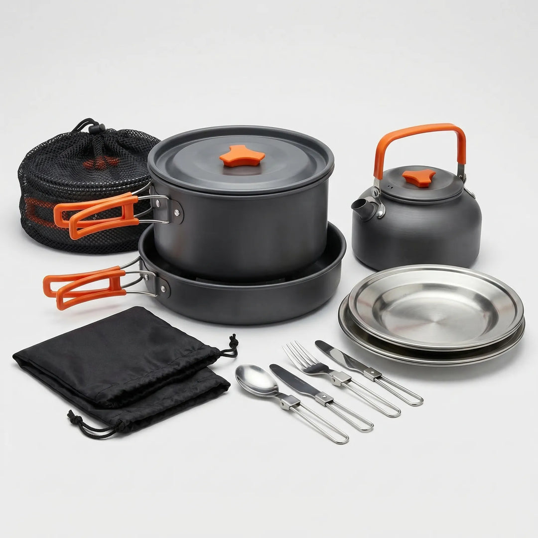 Portable camping cookware set with nesting pots, pans, and camp kettle, perfect for outdoor kitchen & travel.