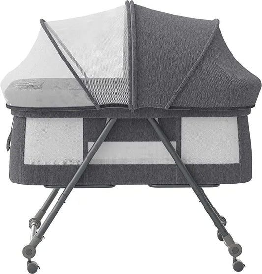 2-in-1 foldable baby travel crib & rocker bassinet with silent wheels, perfect for newborn sleep.