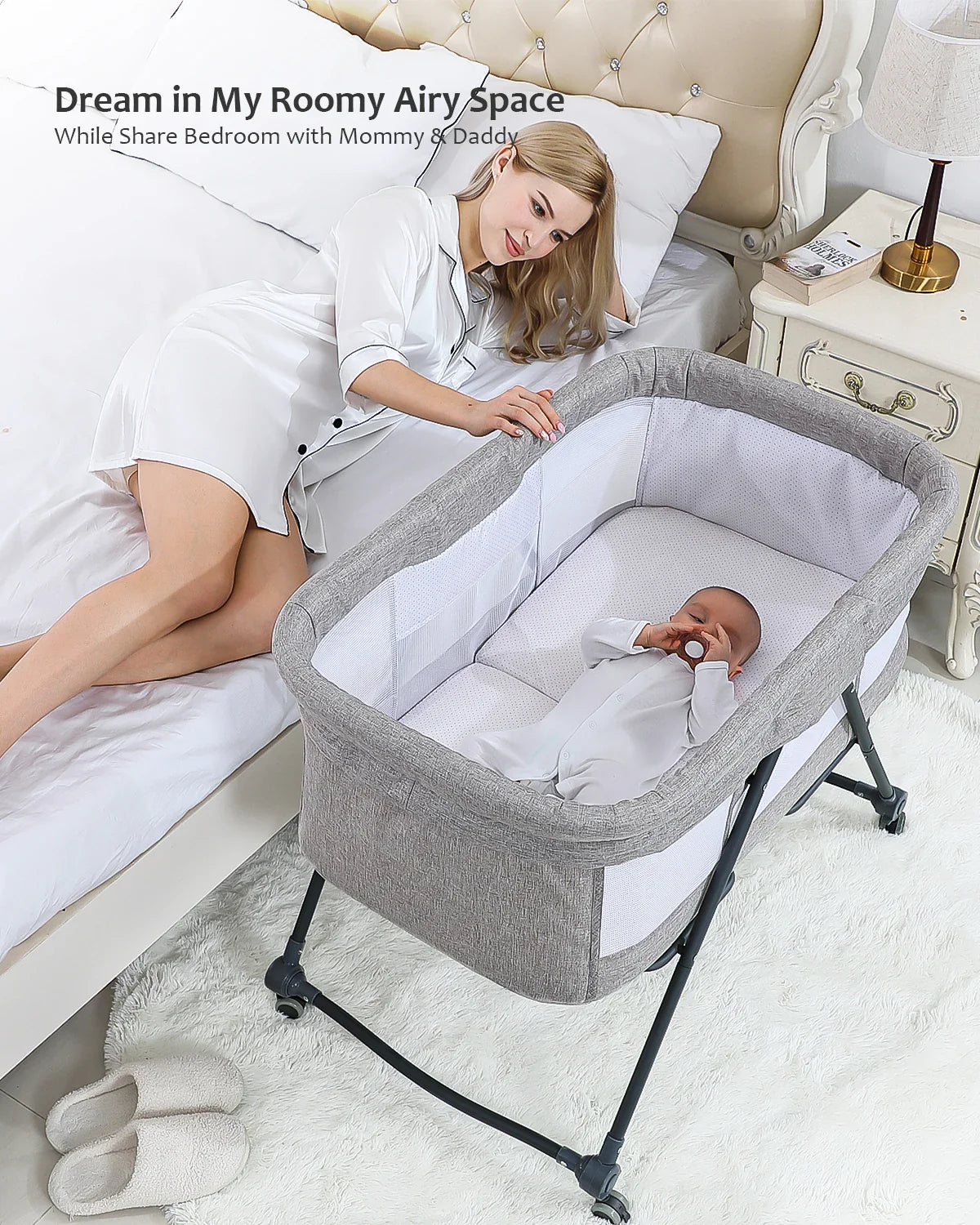 Foldable baby crib with rocking function and silent wheels, ideal for nursery & travel.