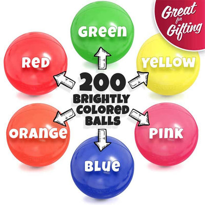Close-up of a hand holding several soft, child-safe pit balls, ideal for toddler toys.