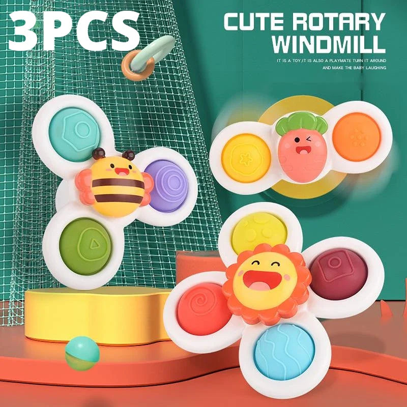 Baby reaching for a spinning top with suction cup, a fun & engaging learning toy gift