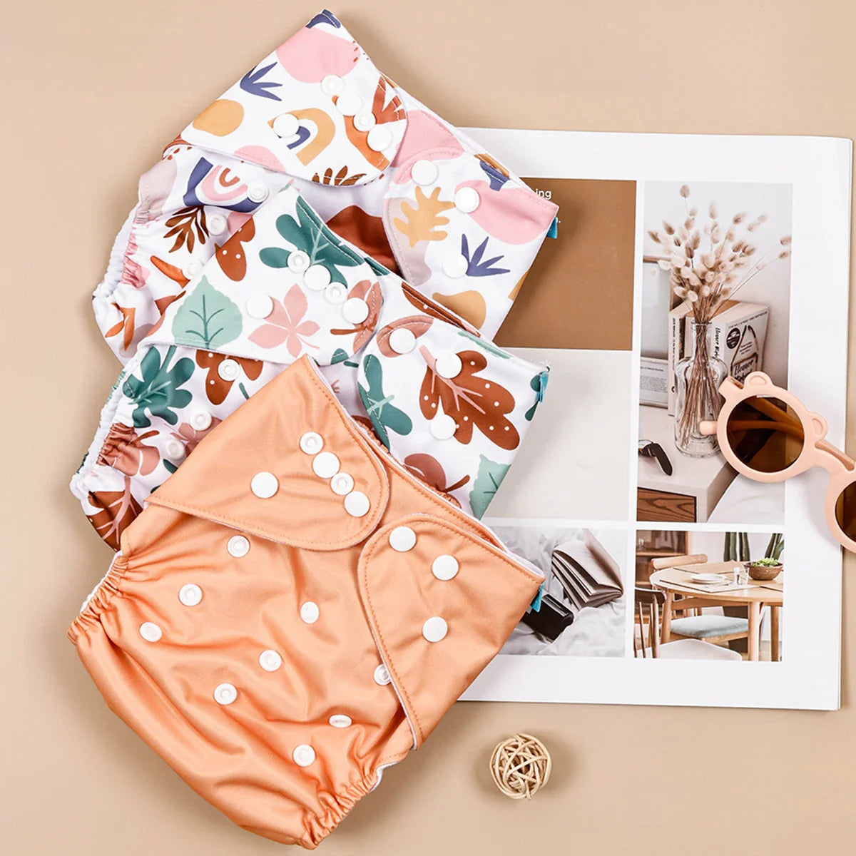 Eco-friendly diaper essentials: 3 reusable cloth diapers, unisex design, for comfortable infant care.