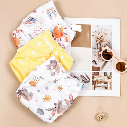 Diaper pack: 3-count reusable ecological cloth diapers, unisex, designed for newborn comfort.