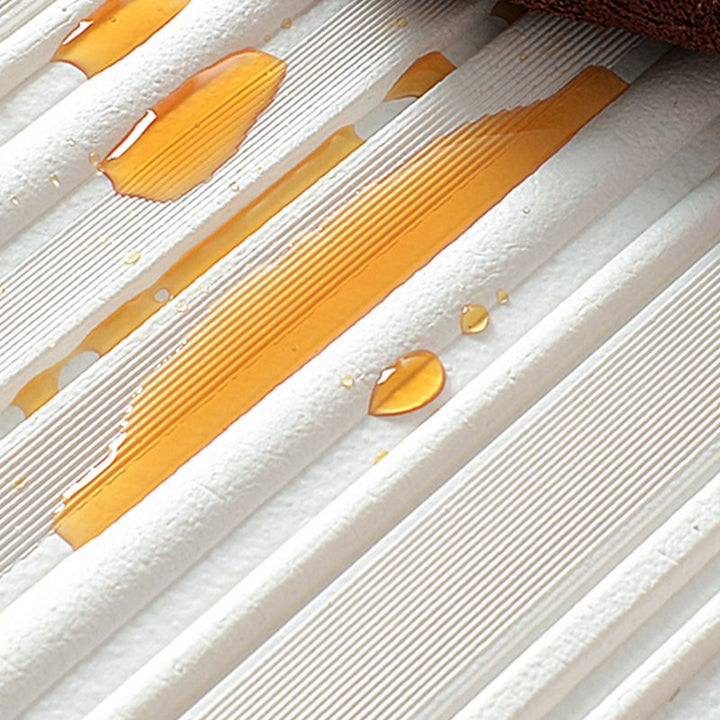 Textured 3D vinyl panels, peel & stick for a modern, easy-to-update wall in any room.