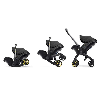 Foldable 4-in-1 baby stroller and car seat combo, lightweight for easy transport, with adjustable handle.