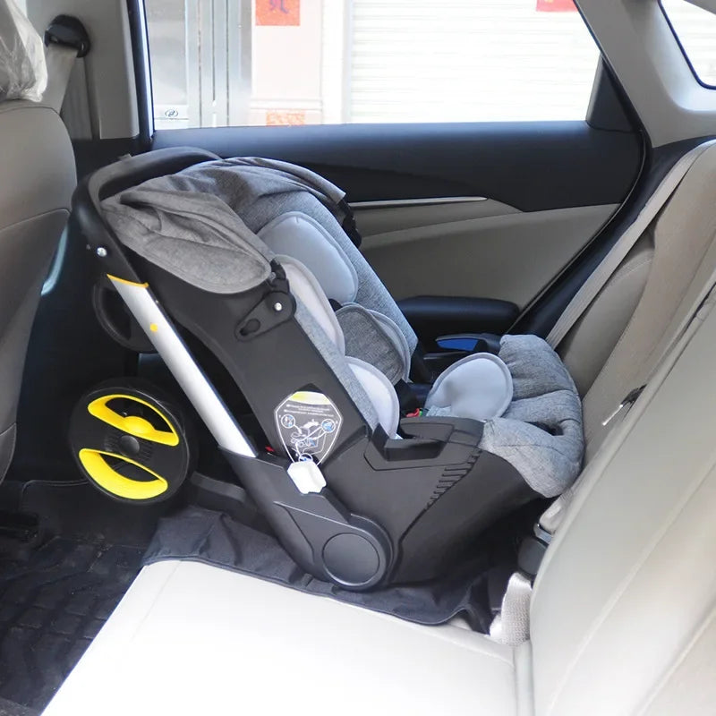 Infant car seat securely clicked into the 4-in-1 baby travel system, suitable for newborn safety.