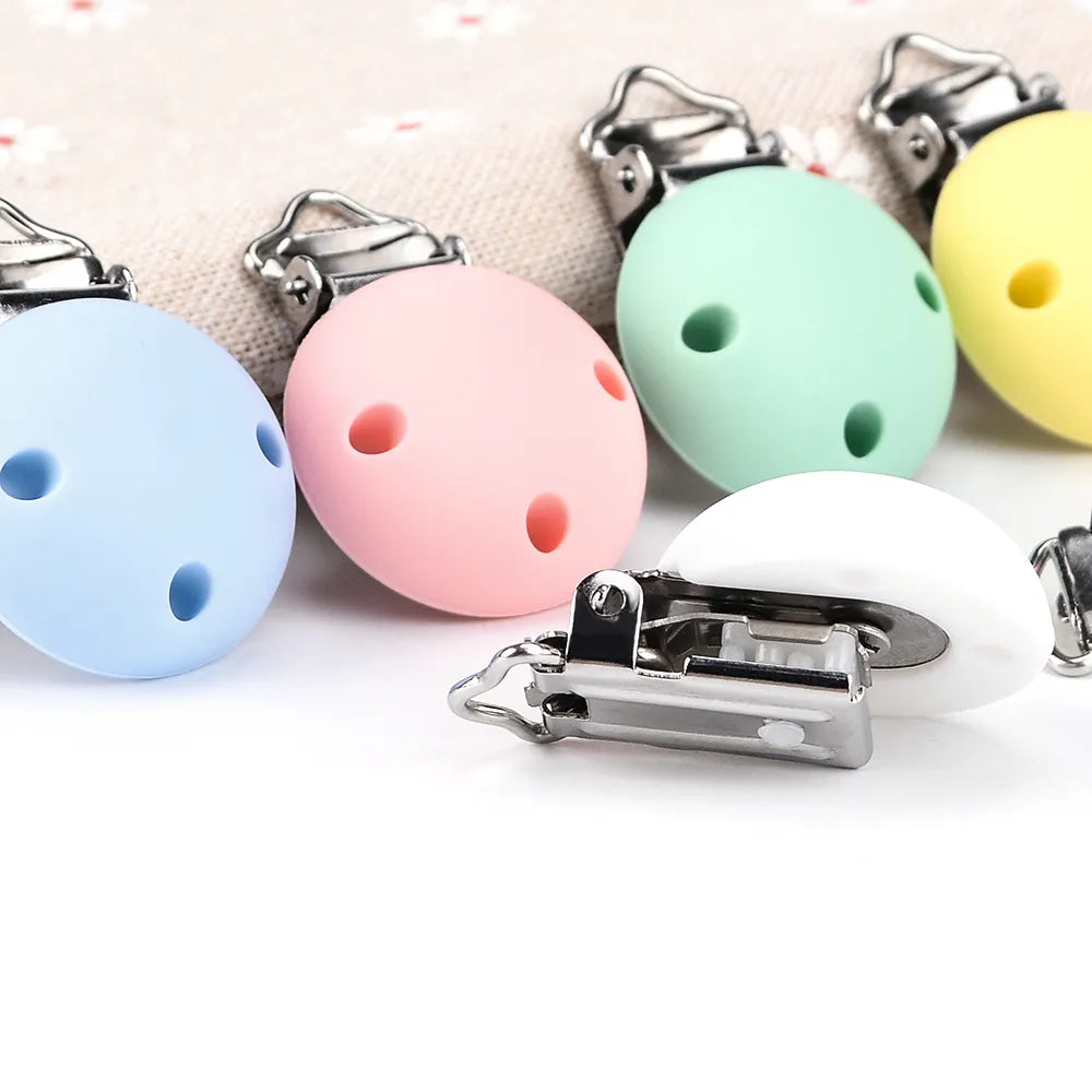 Essential baby accessory: 5 BPA-free silicone round pacifier clips for all infant pacifiers.