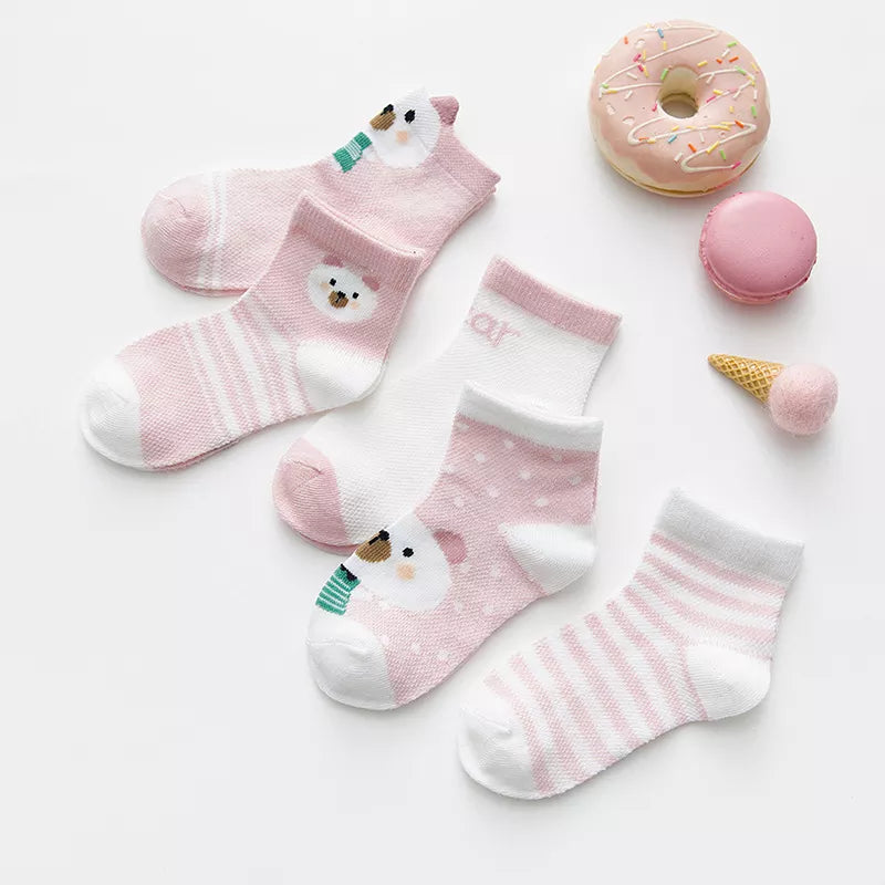 Pile of soft white cotton mesh baby socks, 5 pairs for infants and toddlers 0-2Y