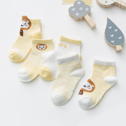 Detail shot of the mesh weave on a white cotton blend infant baby sock for breathability