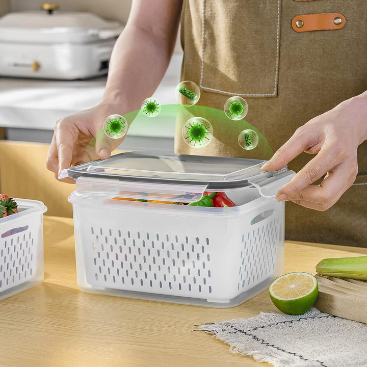 Vegetable keeper container set with removable drainer basket, keeping produce crisp in the refrigerator.