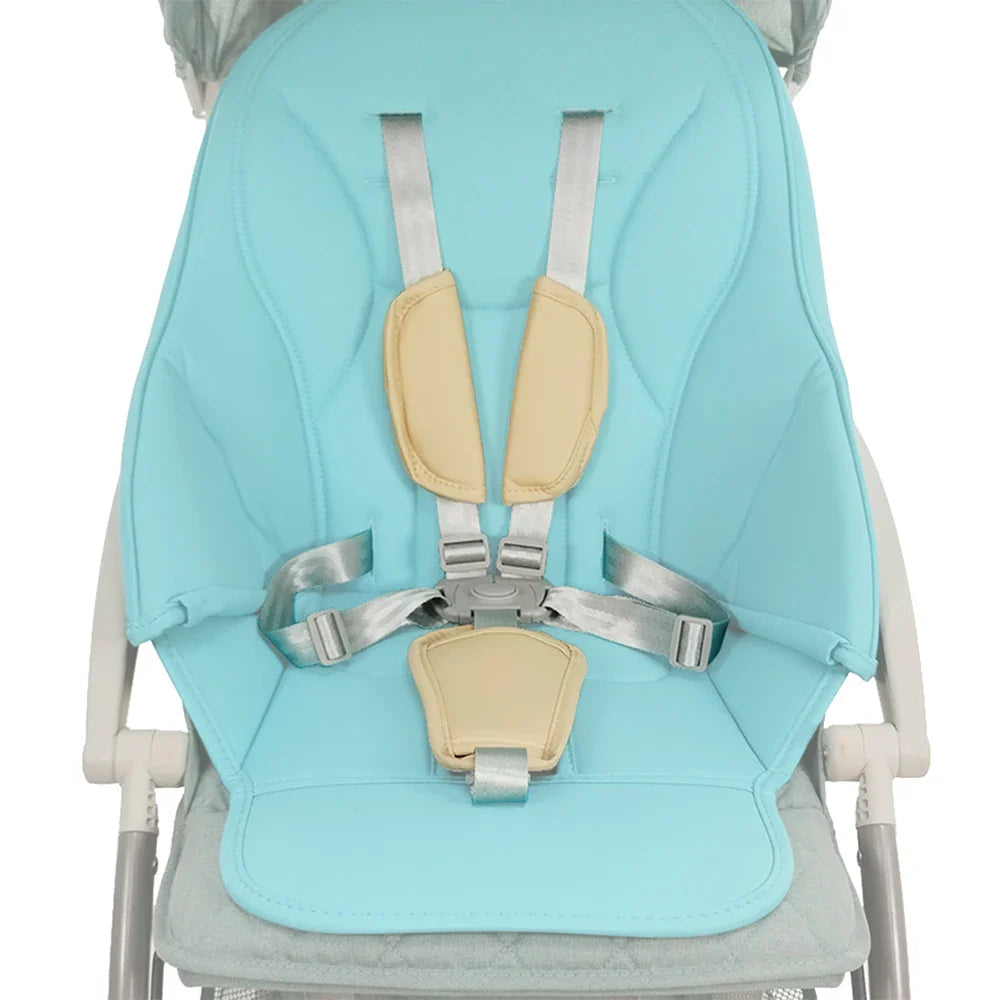 Secure 5-point toddler harness featuring black straps and soft PU pad protectors