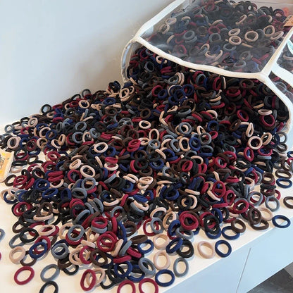 Assorted soft elastic nylon hair ties, 50-count pack for children