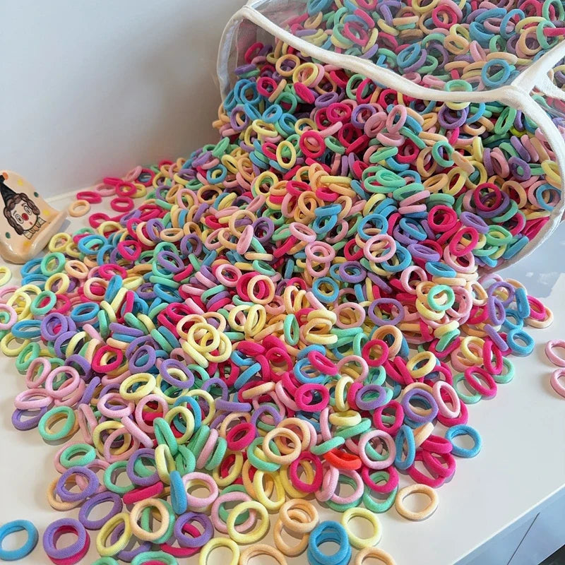 Collection of 50 soft multi-colored nylon hair ties for children's pigtails