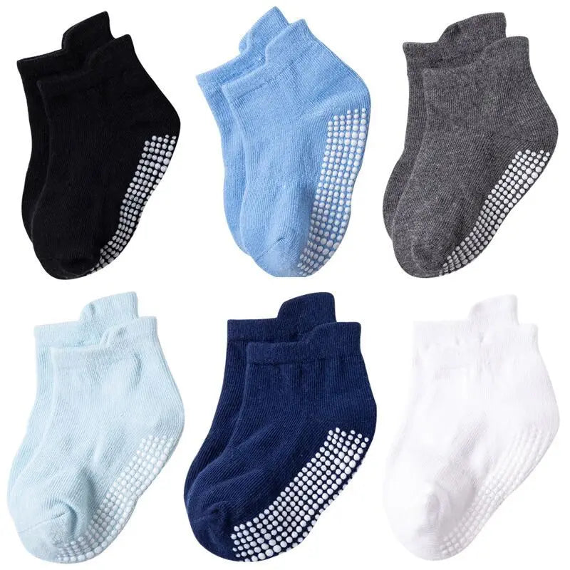 Close-up of the elastic cuff on kids anti-slip cotton socks, comfortable for all-day wear