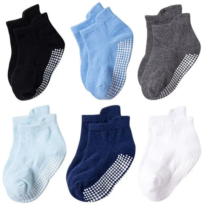 Close-up of the elastic cuff on kids anti-slip cotton socks, comfortable for all-day wear