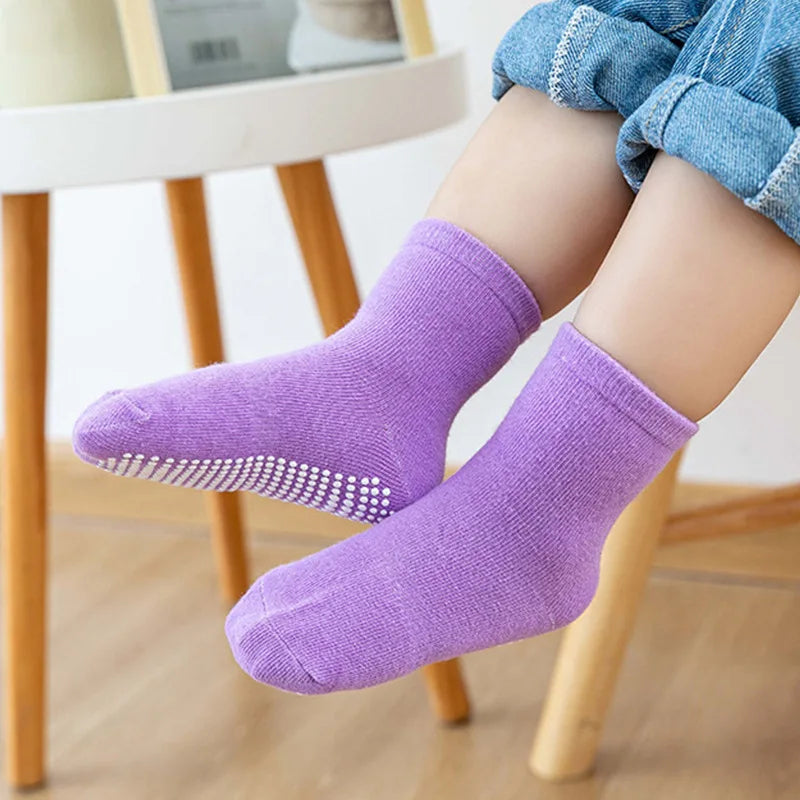 Assorted kids anti-slip cotton socks, 6 pairs, laid out for spring & autumn baby accessories