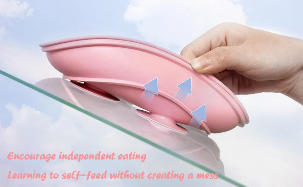 Stylish silicone tableware for toddlers in calming green, with suction plate, bowl, cup, and matching cutlery.