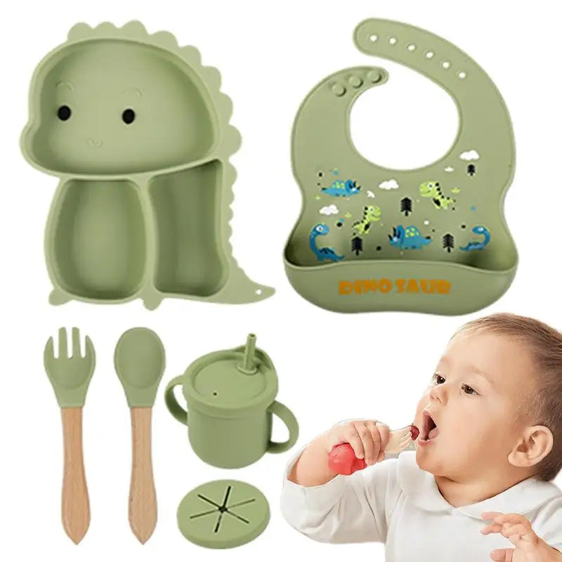 Toddler mealtime set: green dinosaur silicone suction plate, bowl, cup, bib, spoon, fork, & snack lid