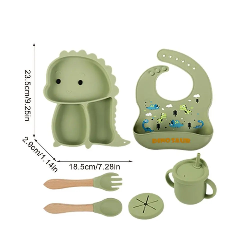 Dinosaur themed silicone suction plate & bowl set for kids' mealtime, preventing spills and promoting self-feeding