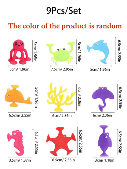 Happy child playing with a colorful 9-piece ocean animal bath toys set, enjoying splashing fun in the bathtub.