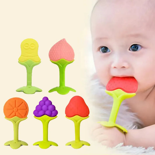 A close-up of a 3-piece baby silicone training toothbrush teether set for infant oral care.