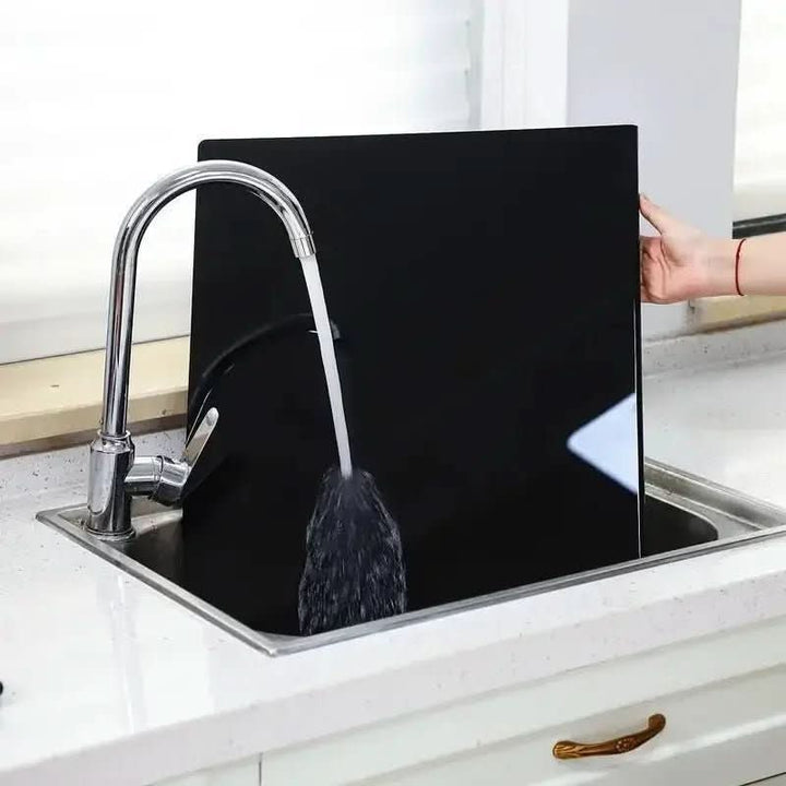 Modern acrylic kitchen board with a protective lip, a practical and stylish gift for home cooks.