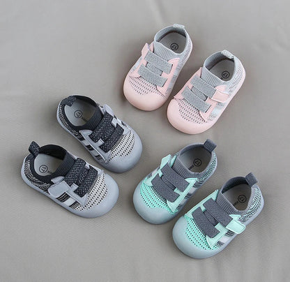 Child running in durable, breathable mesh sports shoes, active kids