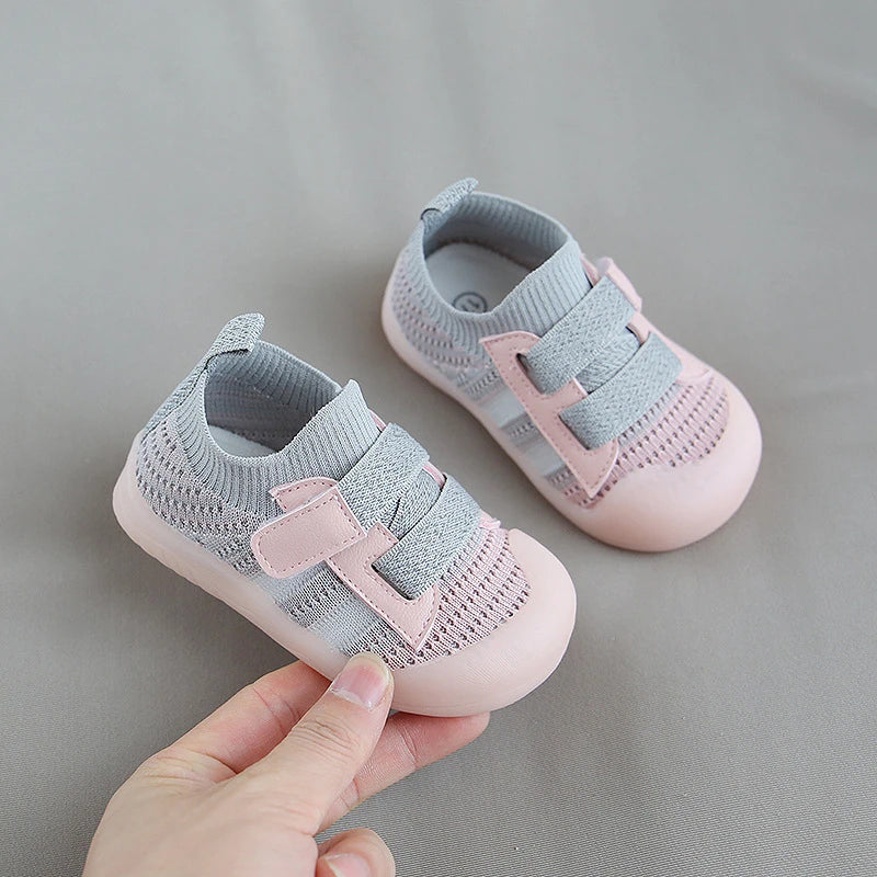 Kids' mesh sneakers in a vibrant green, perfect for active toddlers