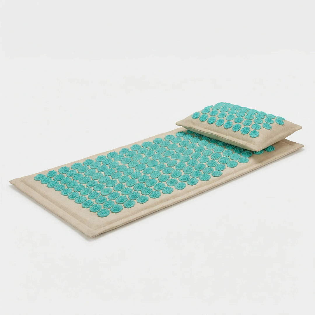 Spiky acupressure mat & neck pillow for massage, stimulating pressure points for wellness & pain relief.