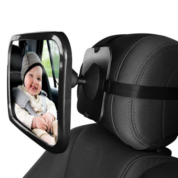 Adjustable baby car mirror for safe rear observation of infants and newborns, providing child safety in vehicle.