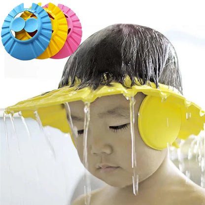 Pink adjustable baby shower cap with ear flaps, ensuring tear-free shampoo for kids