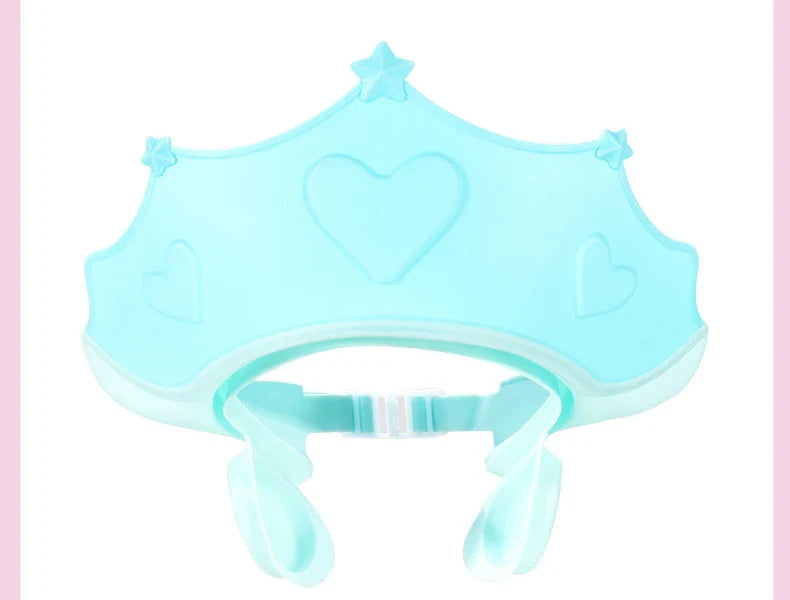 Baby shower cap featuring playful whale design, ear protection, soft and lightweight for infants.