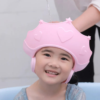 Soft blue baby shower cap with integrated ear covers, ideal for protecting infant eyes and ears.