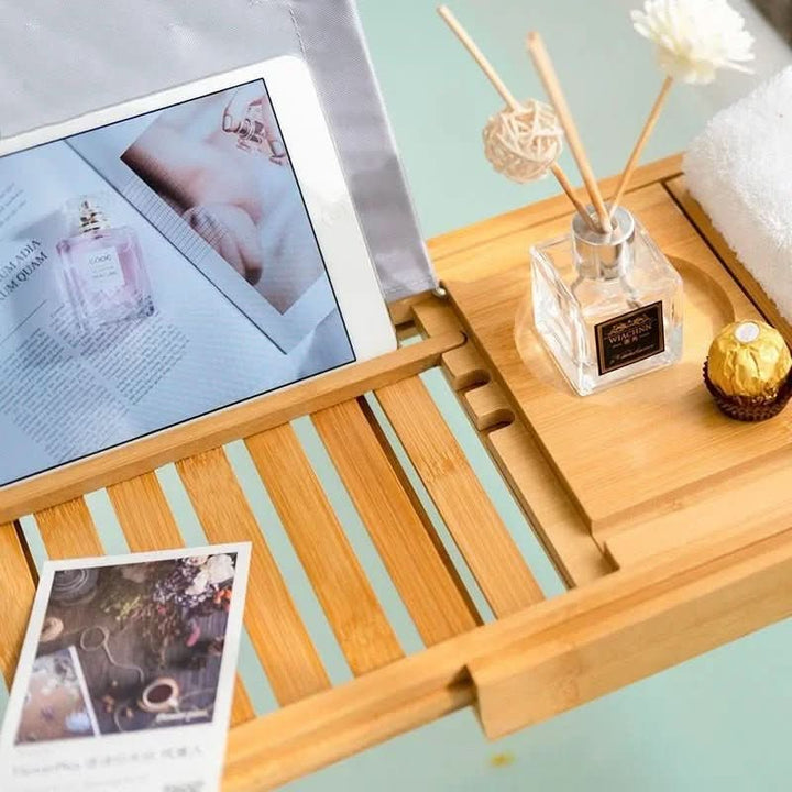 Luxury bamboo bath caddy tray for ultimate self-care & spa experience. Perfect for books, tablets & drinks.