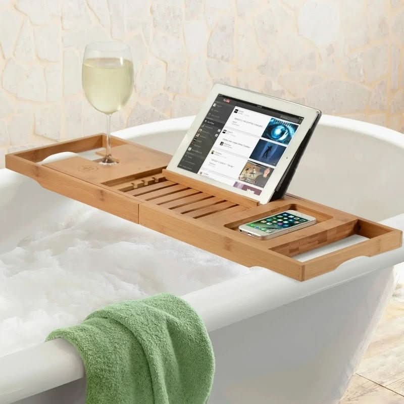 Sustainable bamboo bathtub caddy, extendable and water-resistant. Ideal for a luxurious, eco-friendly spa bath.