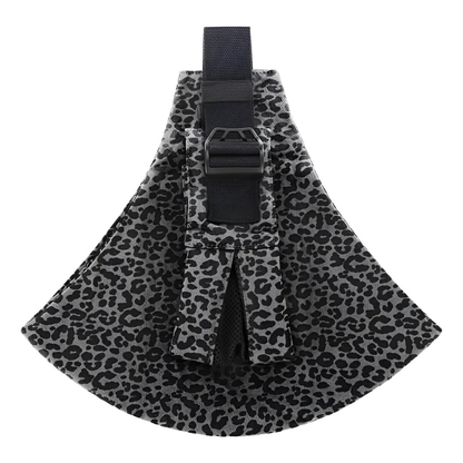 Happy baby sleeping soundly in a cozy, ergonomic baby carrier sling.