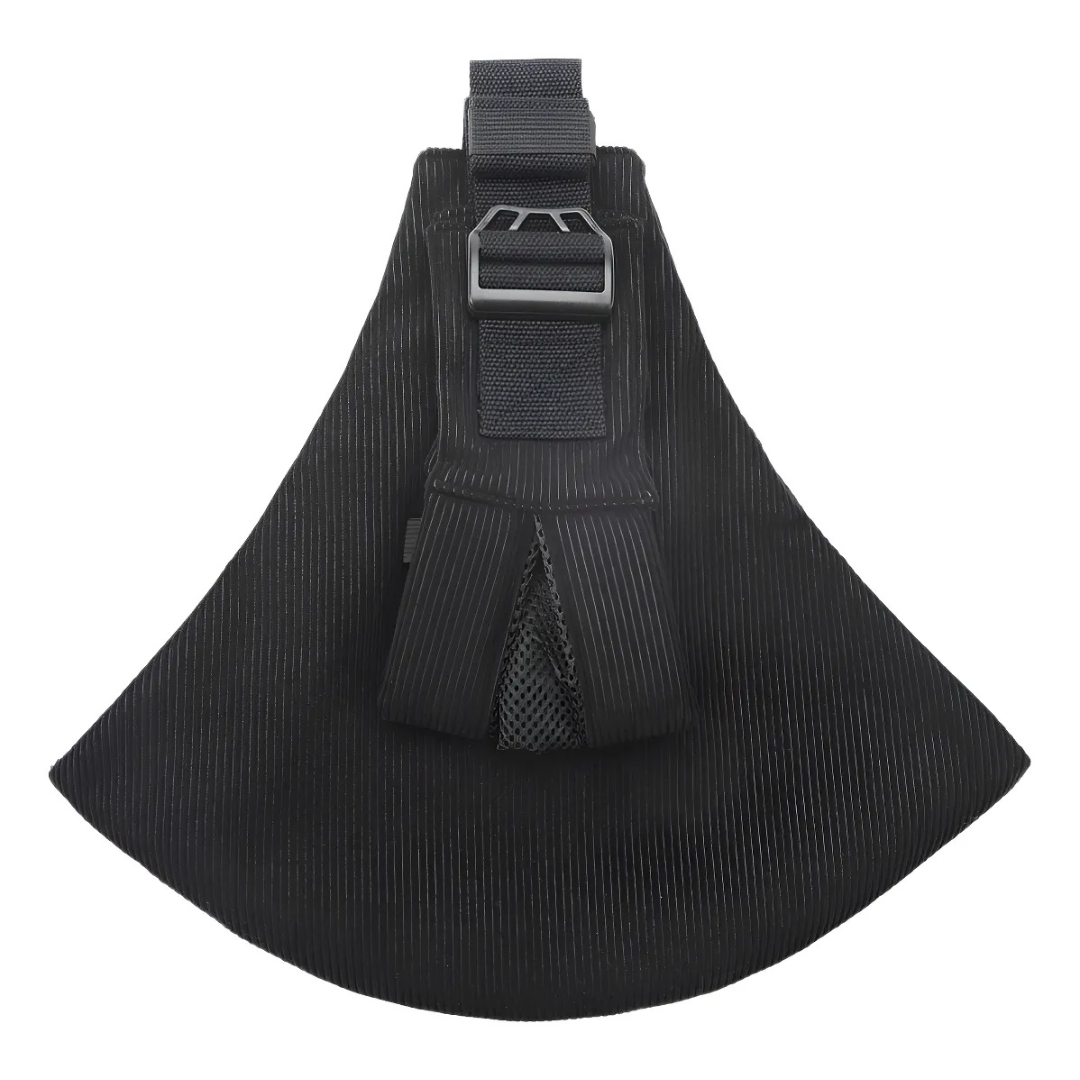 Parent interacting with child comfortably secured in an ergonomic baby carrier sling.