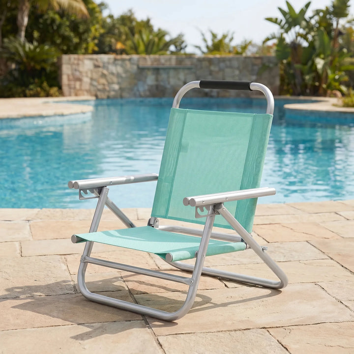 Adjustable folding beach chair, lightweight & portable for outdoor relaxation, camping, and travel.