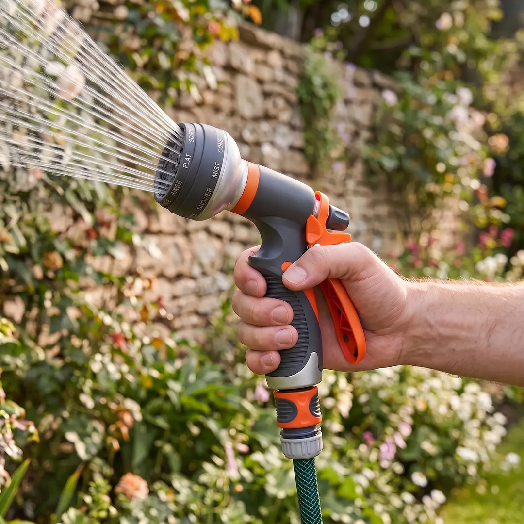 Adjustable garden hose nozzle with multi-pattern spray for versatile watering & outdoor cleaning tasks.