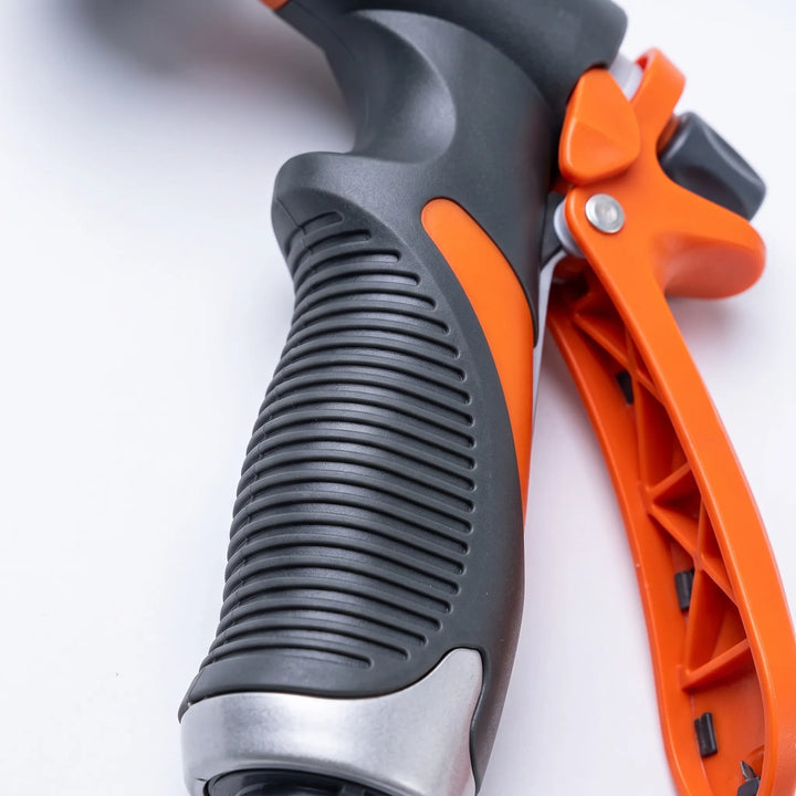 Heavy-duty hose sprayer with adjustable spray patterns, ideal for home garden irrigation & car washing.